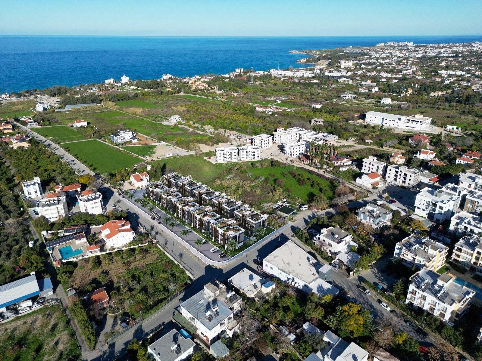 Aerial view of Grand Lapta among Lapta's fields and homes